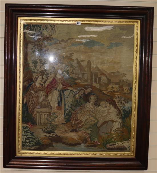 A large Victorian woolwork tapestry, Moses in the bulrushes, in rosewood and gilt frame